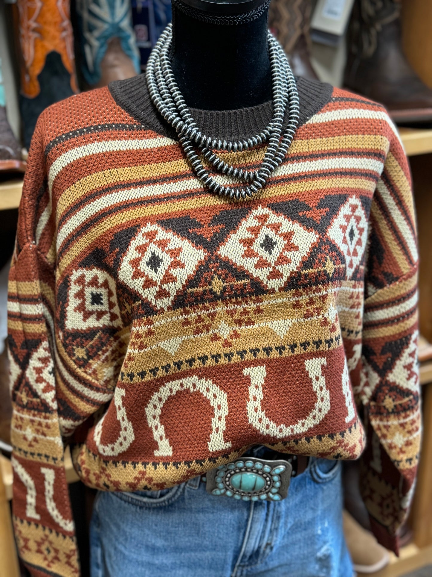 RUST HORSESHOE SWEATER